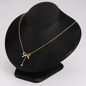 Stainless Steel Ketting Strikje met Steentje – Goud- en Zilverkleurig