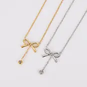 Stainless Steel Ketting Strikje met Steentje – Goud- en Zilverkleurig