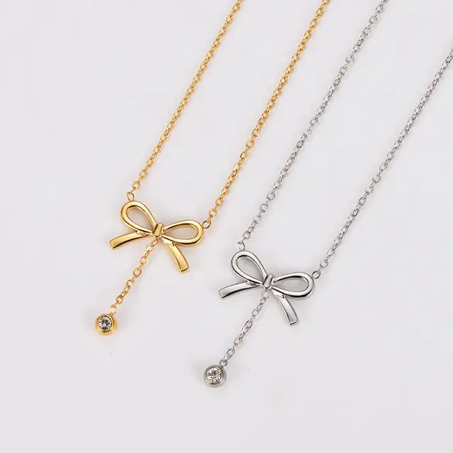 Stainless Steel Ketting Strikje met Steentje – Goud- en Zilverkleurig