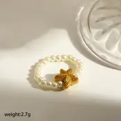 Elastische Stainless Steel Ring Zeester – Goud, Two Tone of Parel