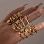 Elastische Stainless Steel Ring Zeester – Goud, Two Tone of Parel