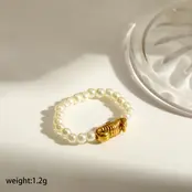 Elastische Stainless Steel Ring Zeepaardje – Goud, Two Tone of Parel