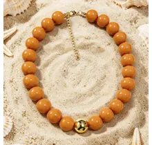 Oranje Kralen Ketting met Gouden Detail – Trendy Zomer Statement