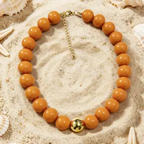 Oranje Kralen Ketting met Gouden Detail – Trendy Zomer Statement