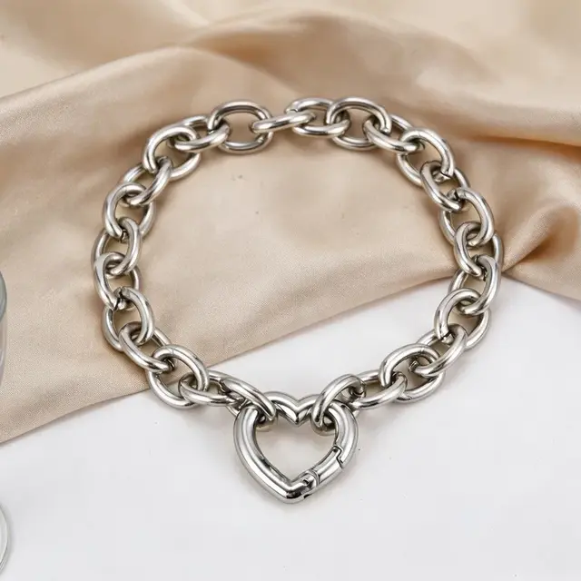 Goodies Label Zilverkleurige Stainless Steel Schakelarmband met Hart Clicker