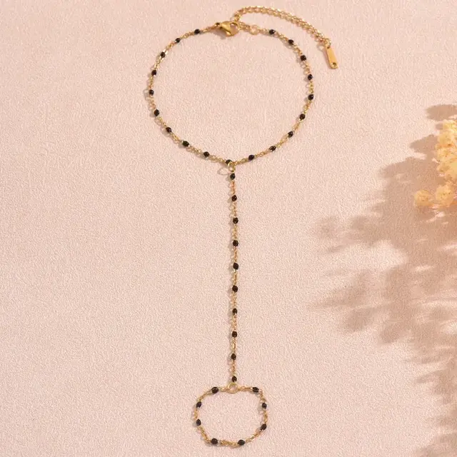 Goudkleurige Stainless Steel Handketting met Zwarte Kralen | Goodies