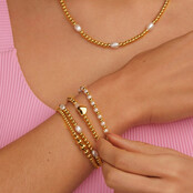 Elastische Parelarmband met Gouden Kralen