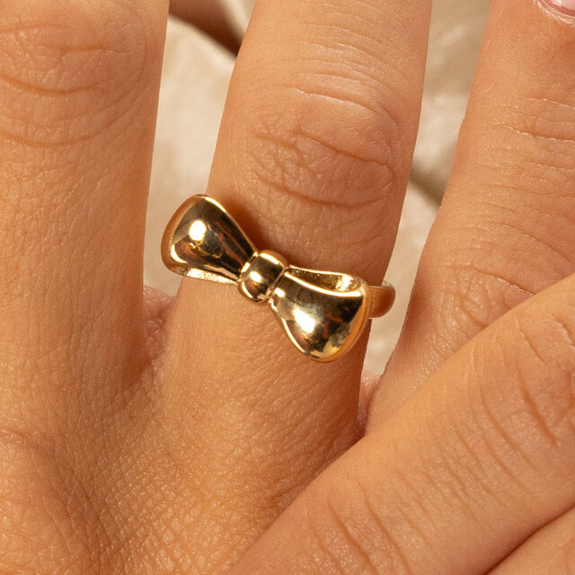 Gouden ring met strik