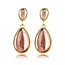 My Bendel Elegante Gouden Oorbellen met Roze Druppelsteen