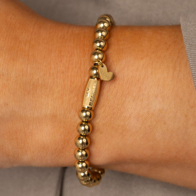 Elastische Kralenarmband • 6 mm • Goud
