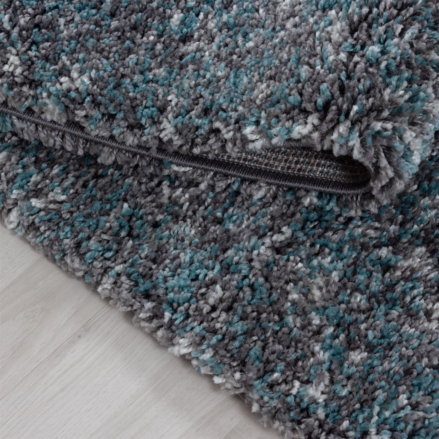 Ben je op zoek naar een Hoogpolig Blauw - Grijs Cream - vloerkleed? Lorium bestaat uit verschillende dessins kleuren. - Flycarpets.nl