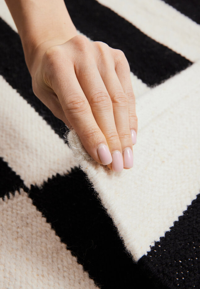 Wollen vloerkleed - Donna Zwart/Wit Wollen vloerkleed - Donna Zwart/Wit