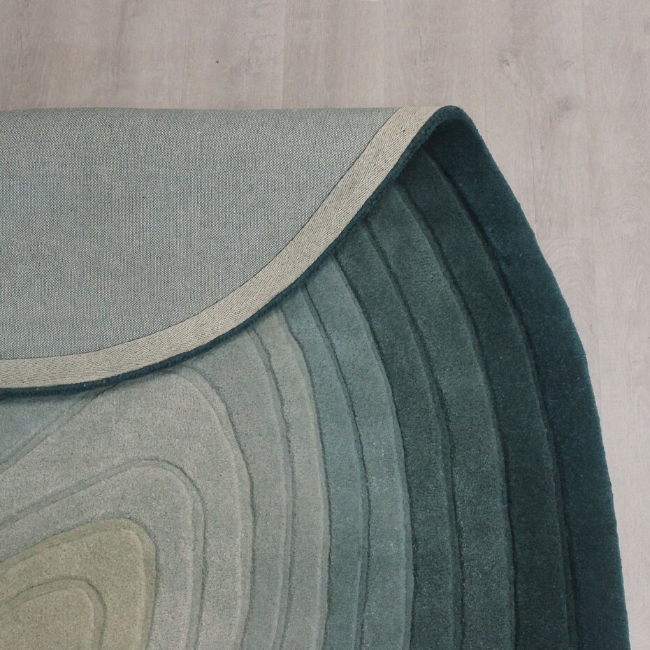 Organisch wollen vloerkleed - Puddle Petrol Blauw Organisch wollen vloerkleed - Puddle Petrol Blauw