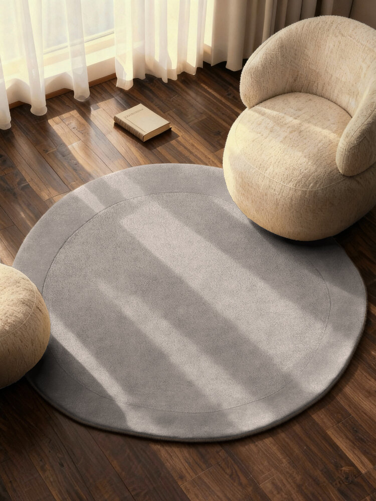 Organisch rond wollen vloerkleed - Kari Grijs