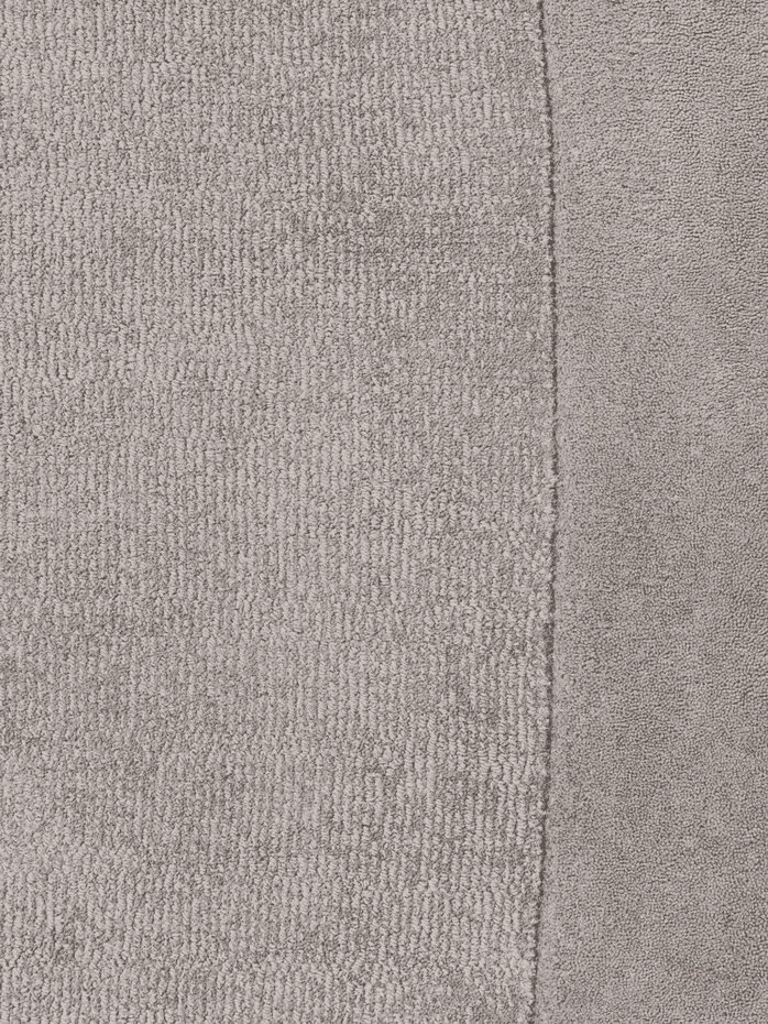 Organisch rond wollen vloerkleed - Kari Grijs