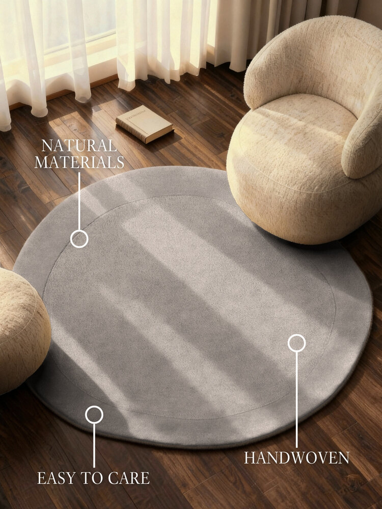 Organisch rond wollen vloerkleed - Kari Grijs
