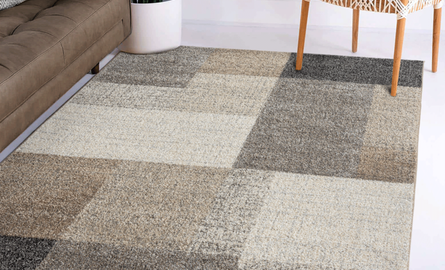 Welke kleur vloerkleed bij bruine bank?