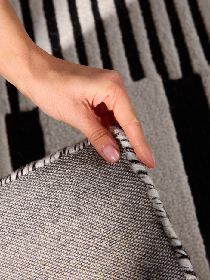 Wollen vloerkleed geometrisch - Stryve Pulse Zwart/Wit Wollen vloerkleed geometrisch - Stryve Pulse Zwart/Wit