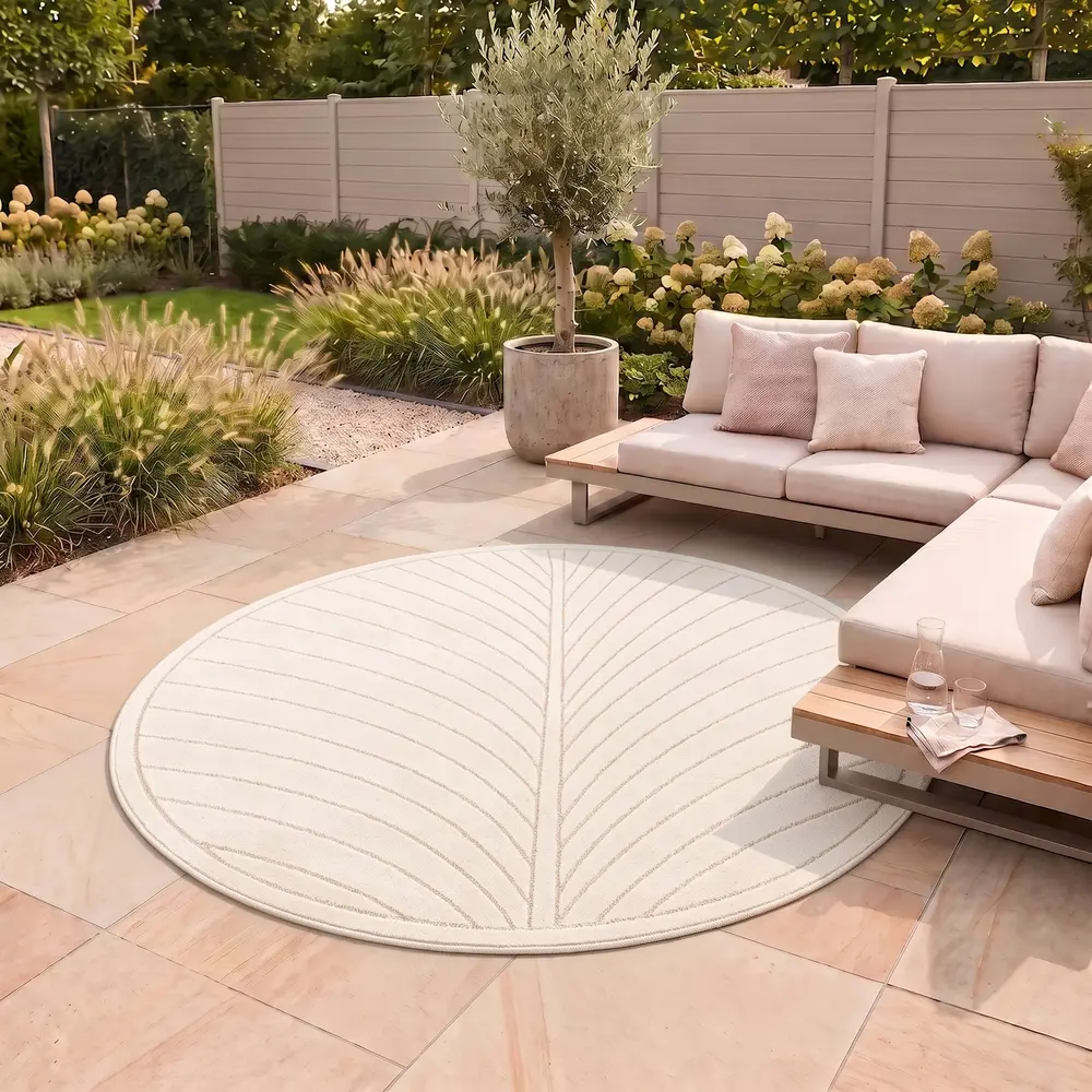 Rond palmblad binnen- en buitenkleed – Novara Creme Rond palmblad binnen- en buitenkleed – Novara Creme