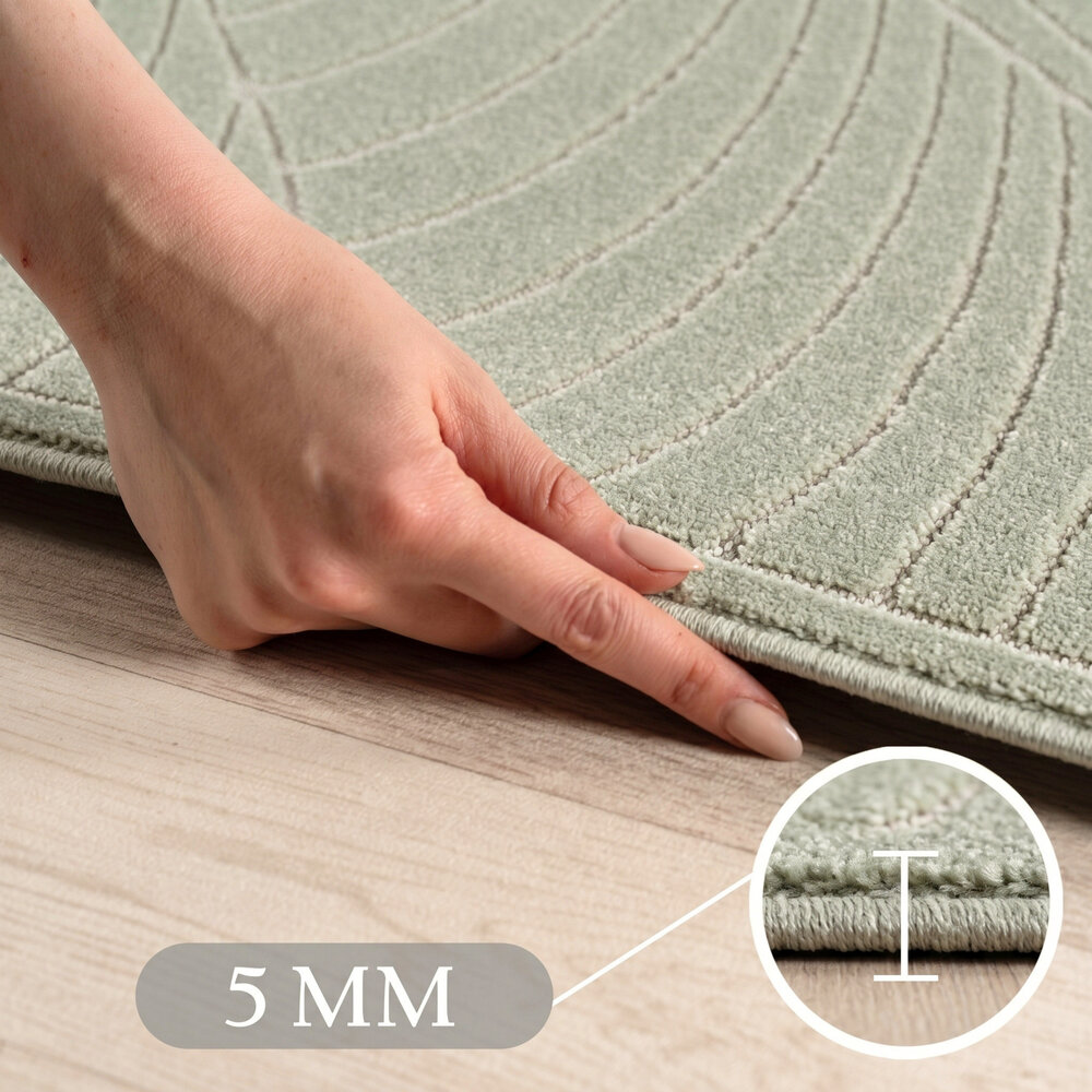 Rond palmblad binnen- en buitenkleed – Novara Groen Rond palmblad binnen- en buitenkleed – Novara Groen