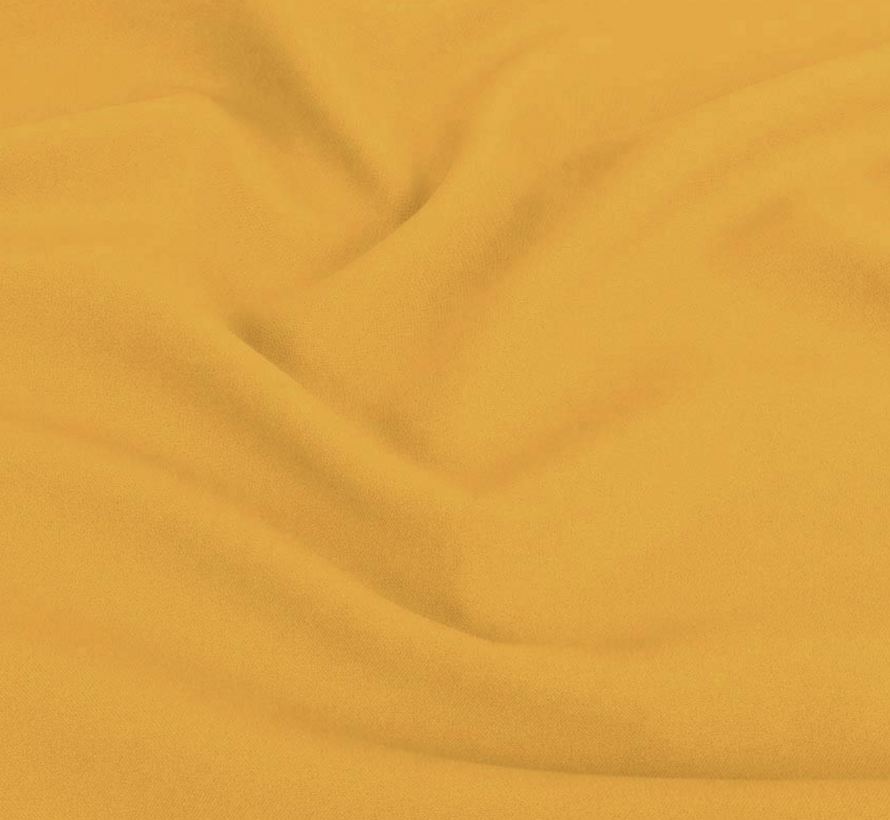 Okergele terlenka stof – Warme en trendy kleur voor mode en interieur