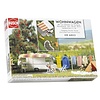 Busch Caravan met diverse toebehoren (1:87)