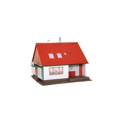 Kibri Een familiehuis met winkel (1:87)