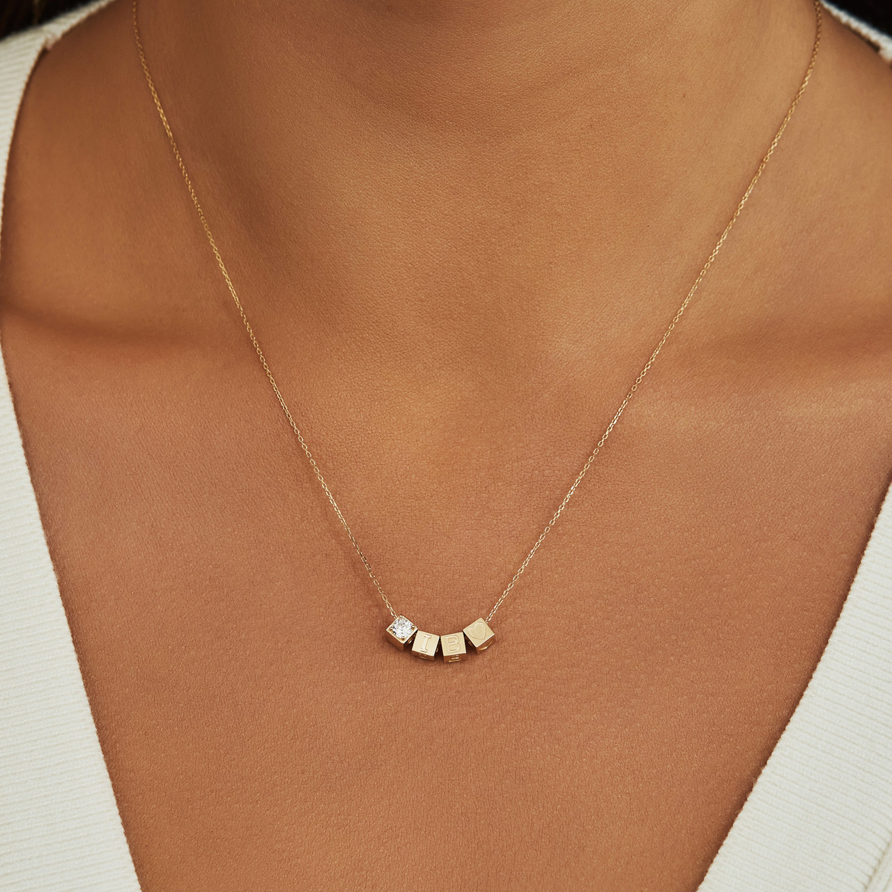 Isabel Bernard Le Marais Felie 14 karat gold cube charm with zirconia stone