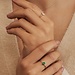 Isabel Bernard Baguette Olivia 14 karaat gouden ring met groene zirkonia steen