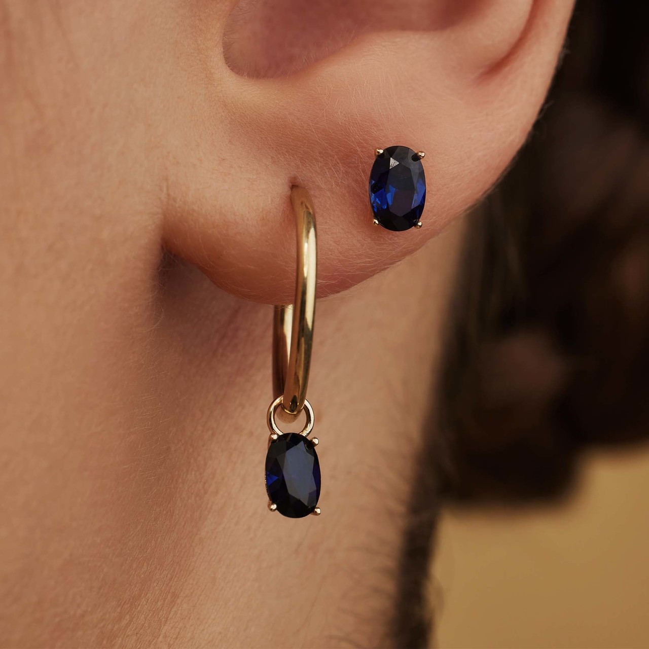 Isabel Bernard Baguette Nila 14 karat gold stud ear studs with blue zirconia stone