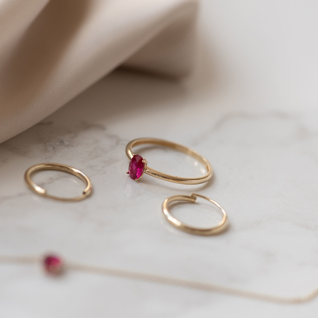 Isabel Bernard Baguette Roux 14 karat gold ring with red zirconia stone