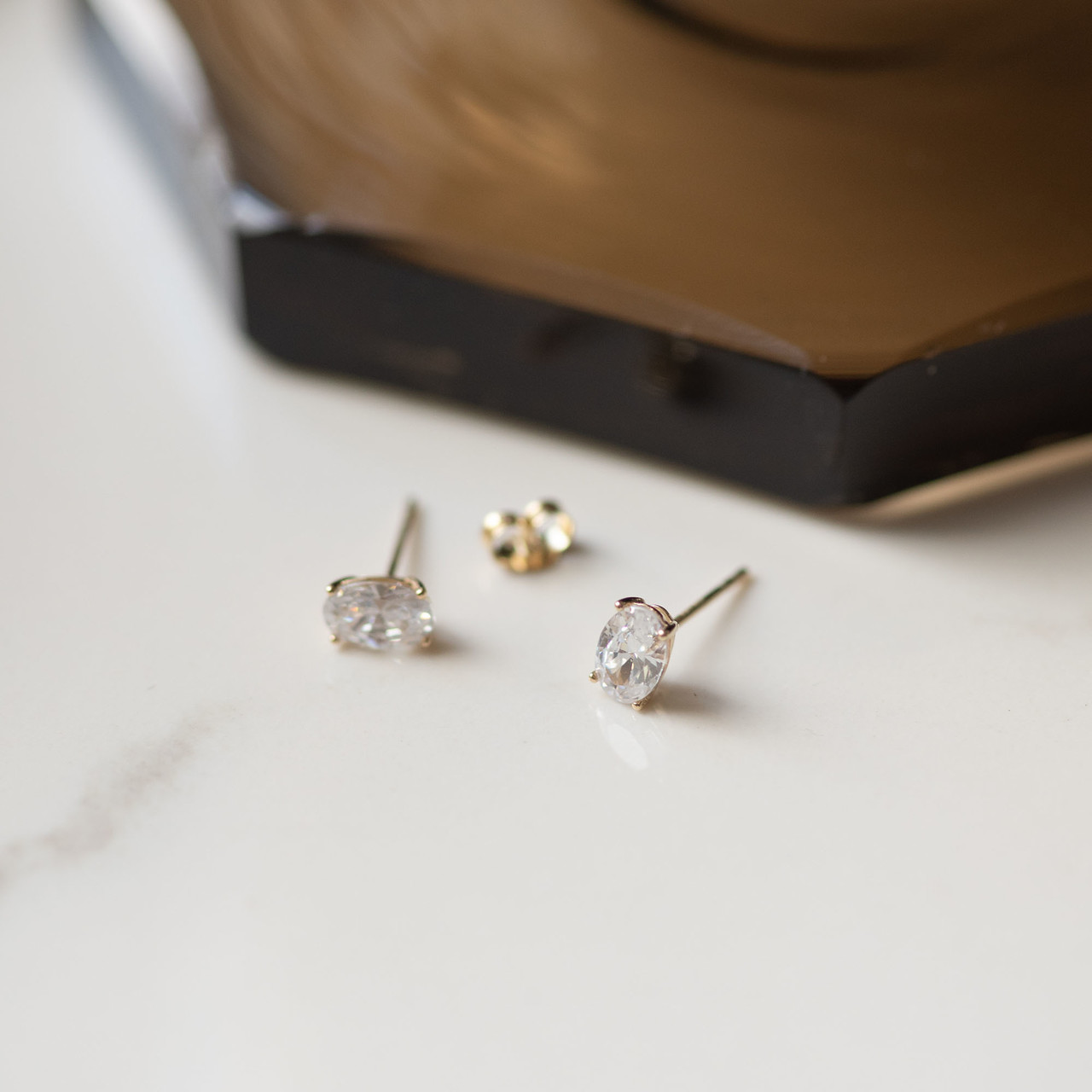 Isabel Bernard Baguette Genevieve 14 karat gold stud ear studs with white zirconia stone
