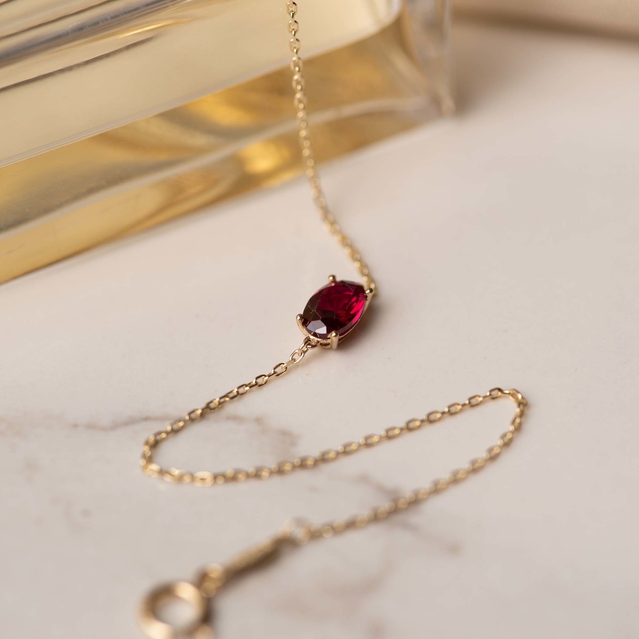 Isabel Bernard Baguette Roux 14 karat gold bracelet with red zirconia stone
