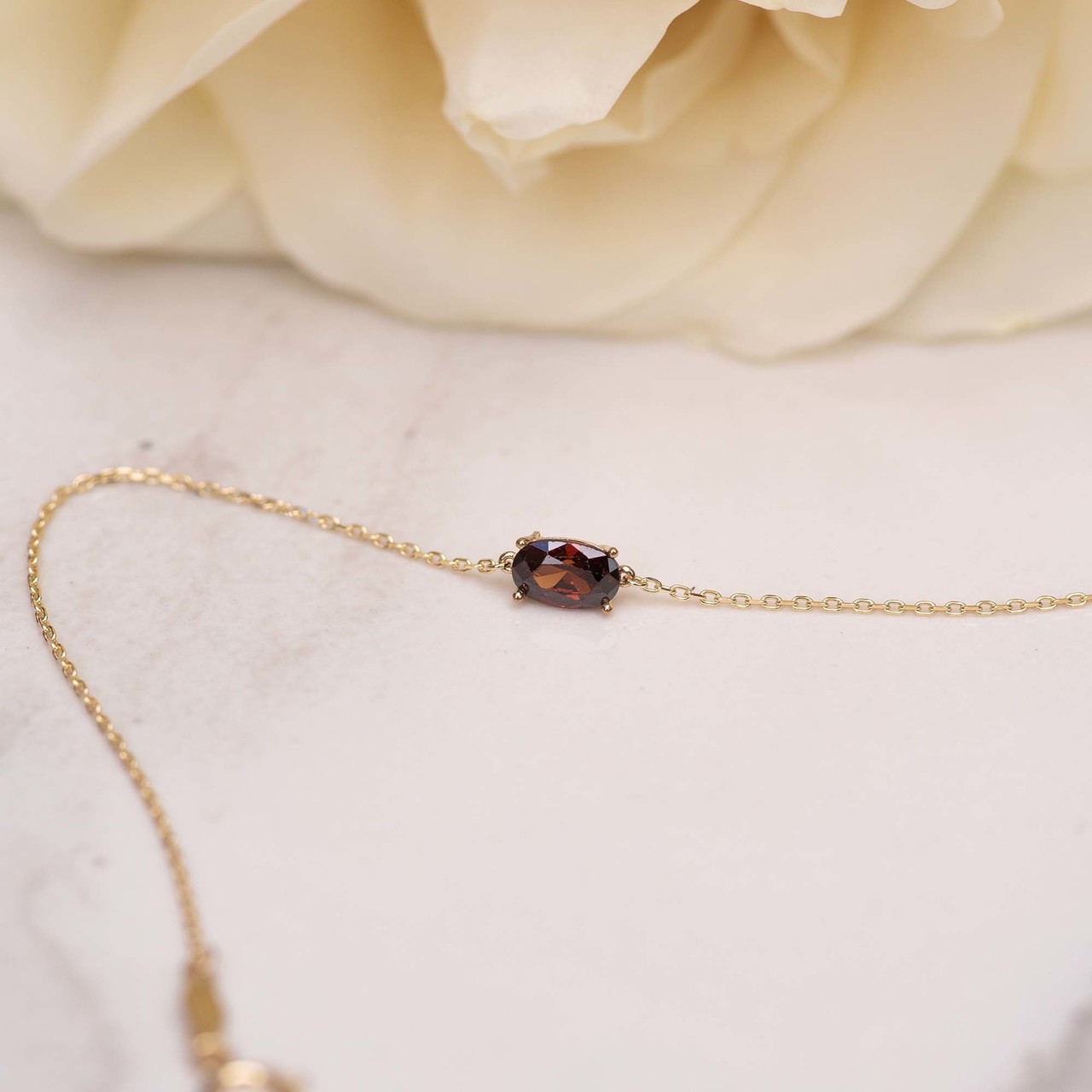 Isabel Bernard Baguette Brune 14 karat gold bracelet with brown zirconia stone