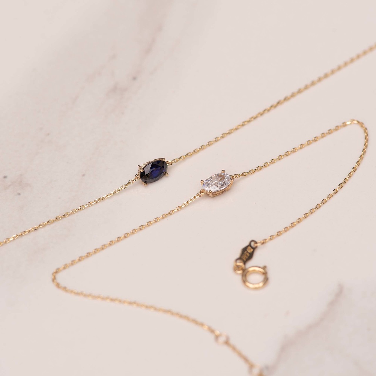 Isabel Bernard Baguette Nila 14 karat gold bracelet with blue zirconia stone