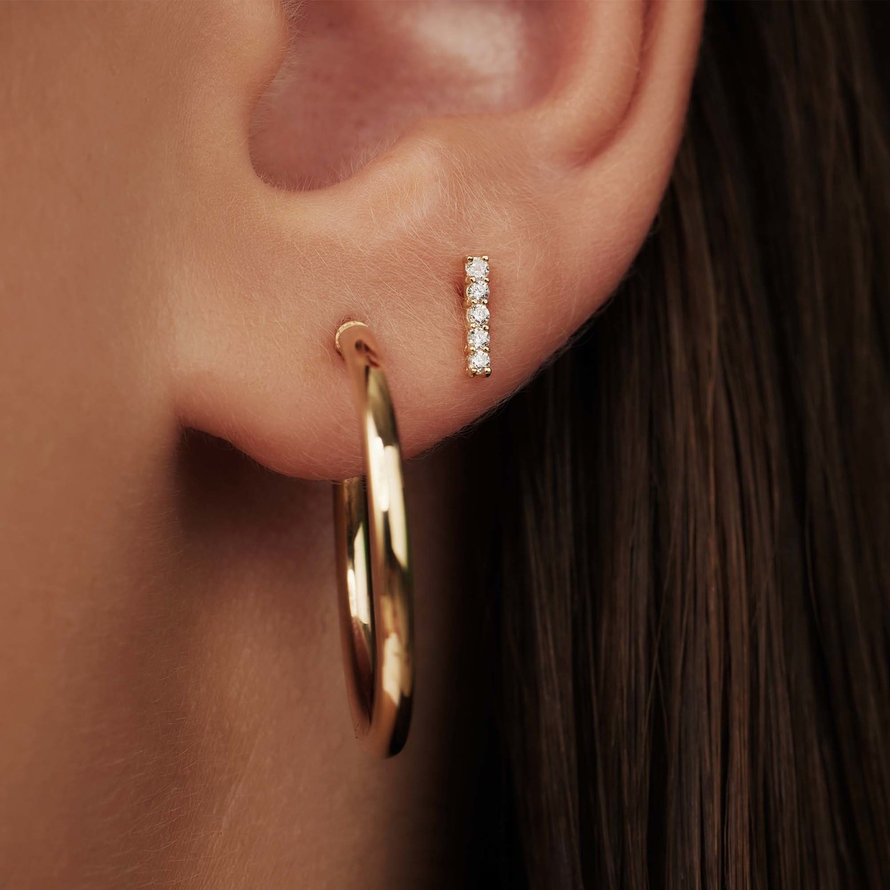 Isabel Bernard Rivoli Esmée 14 karat gold ear studs with zirconia stones