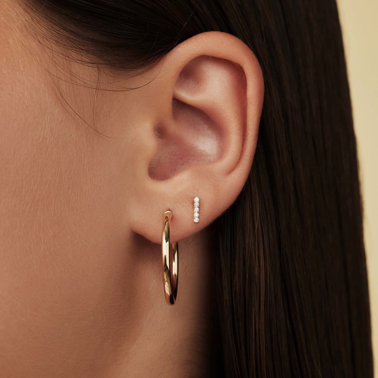 Isabel Bernard Rivoli Esmée 14 karat gold ear studs with zirconia stones