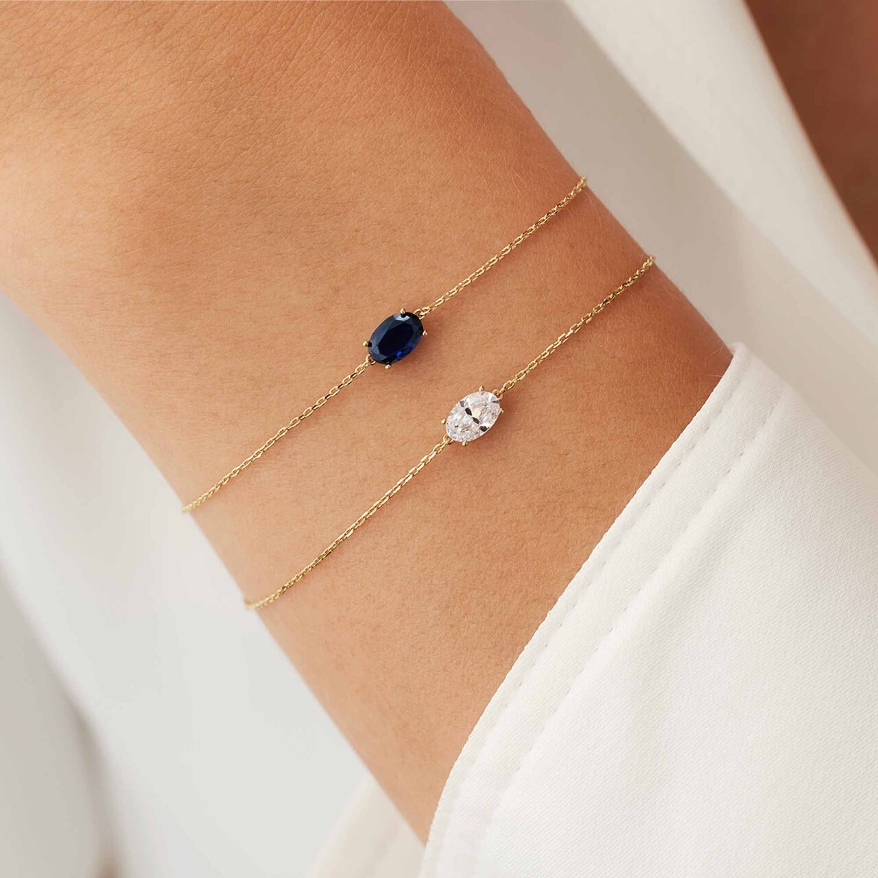 Isabel Bernard Baguette Nila 14 karat gold bracelet with blue zirconia stone