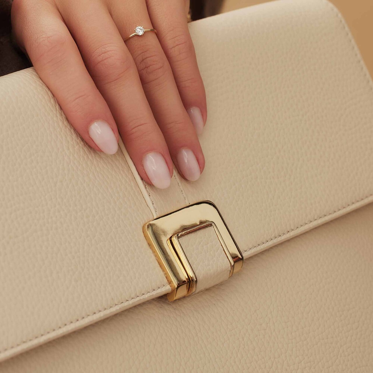 Isabel Bernard Honoré Clara cream calfskin leather laptop sleeve with shoulder strap