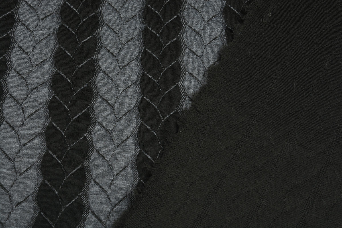 Strickstoff Zopfmuster Jersey Grau Schwarz