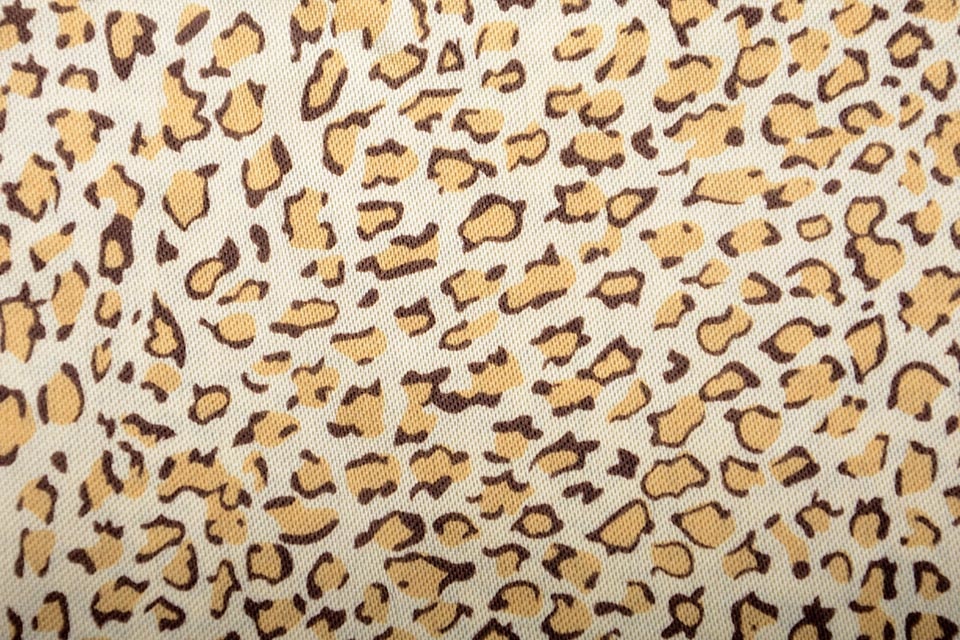 Polyester-Satin Pantherdruck Gold