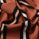 Crepe Bedrukt Lizzy Strepen Oranje Brique