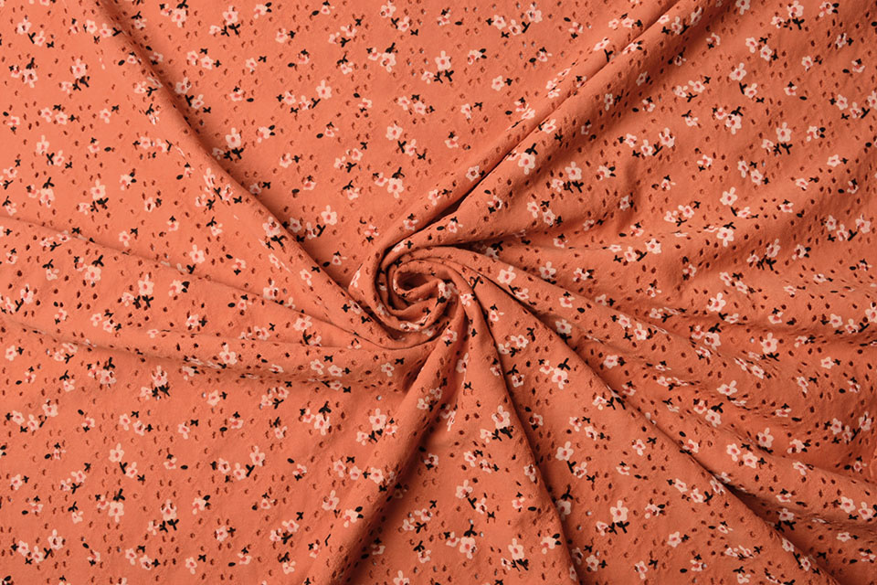 Katoen Jersey Broderie Bloemen Oranje Brique