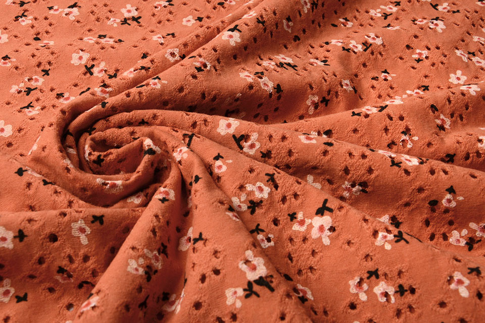 Katoen Jersey Broderie Bloemen Oranje Brique