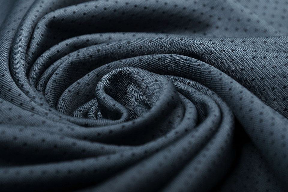 Close-up polyester fabric texture of black athletic shirt Stock Photo