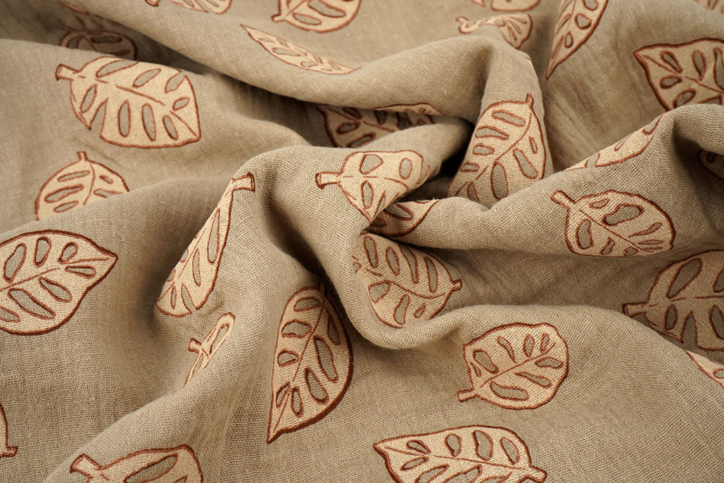 Baumwoll Musselin Monstera Leaves Sand