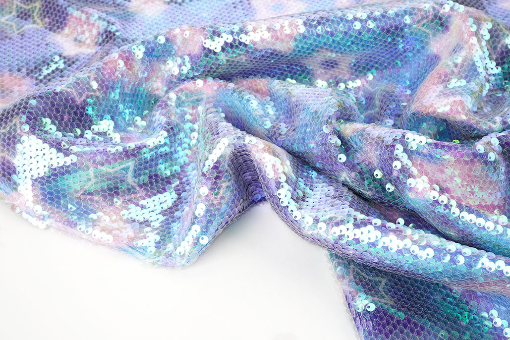 Sequin Fabric Pearlescent on Printed Satin Stars