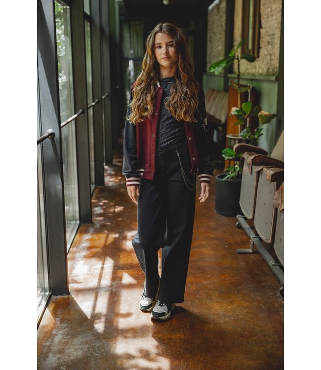 Black denim with chain belt