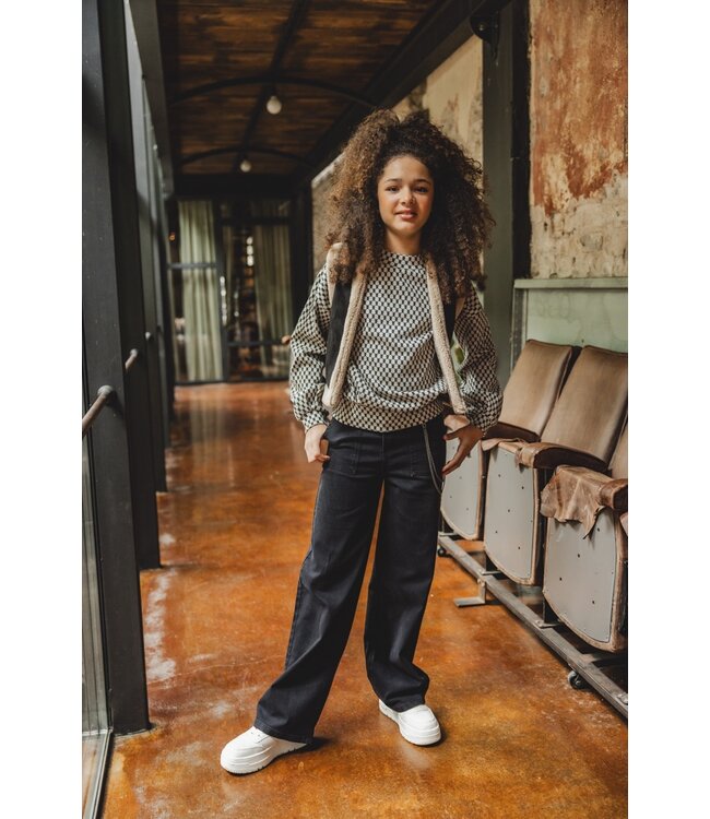 Black denim with chain belt