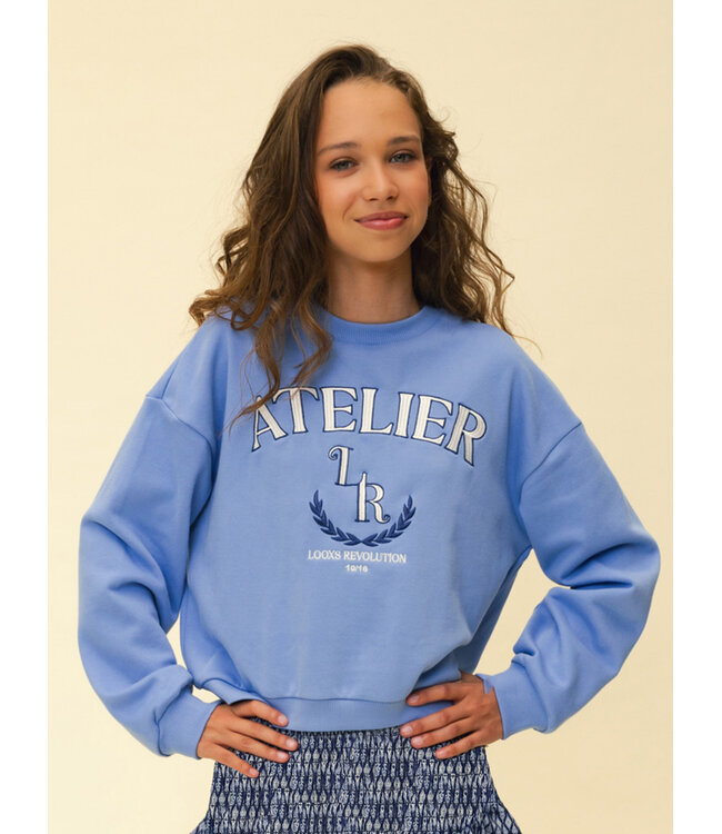 Blauer Atelier-Pullover